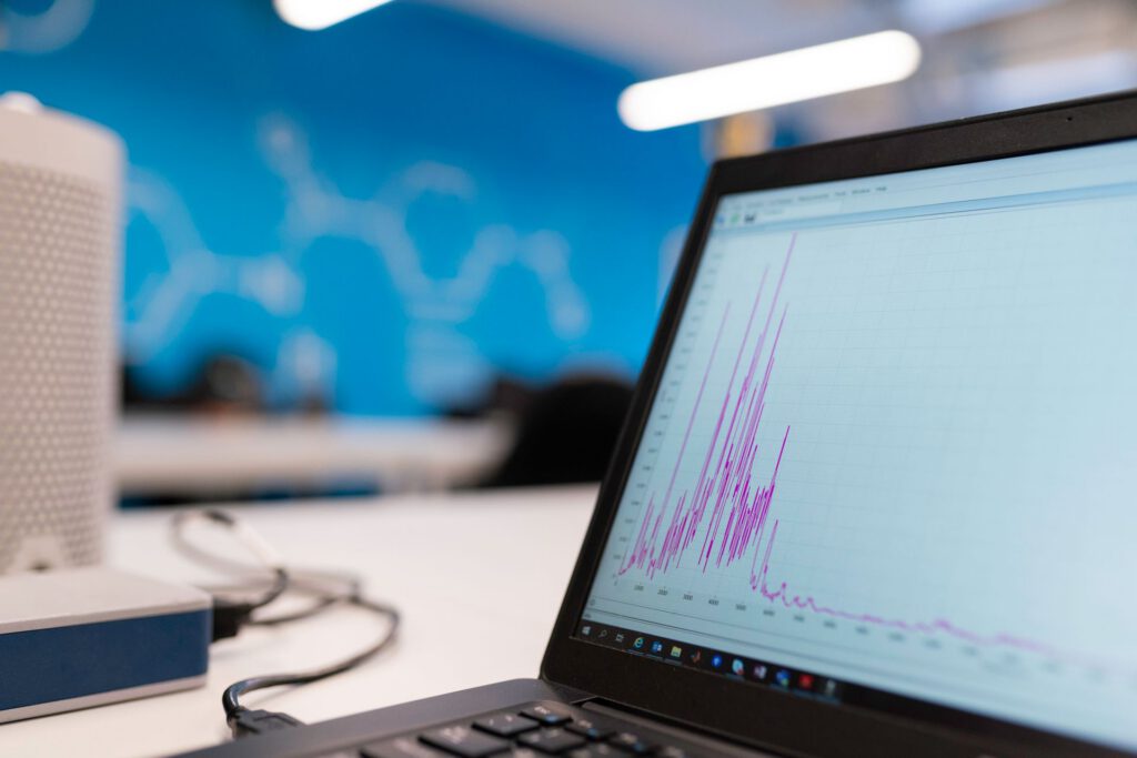 Line graph on a laptop screen in an office